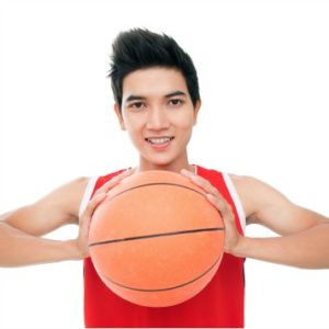 young athlete with basketball