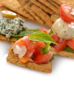 whole grain crackers with different toppings for healthy holiday appetizers kids can make