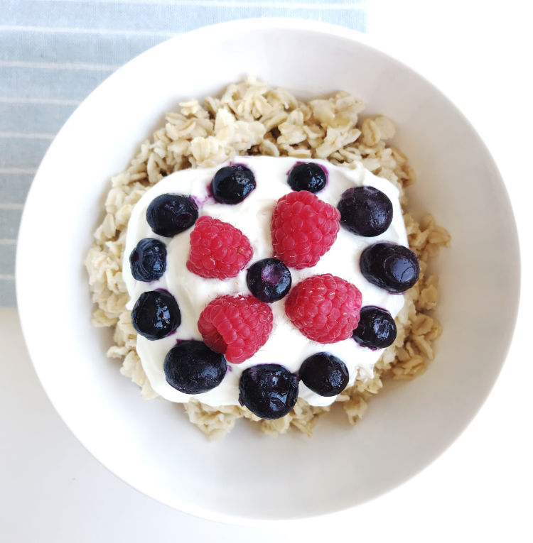 Oatmeal with blueberries, raspberries, greek yogurt