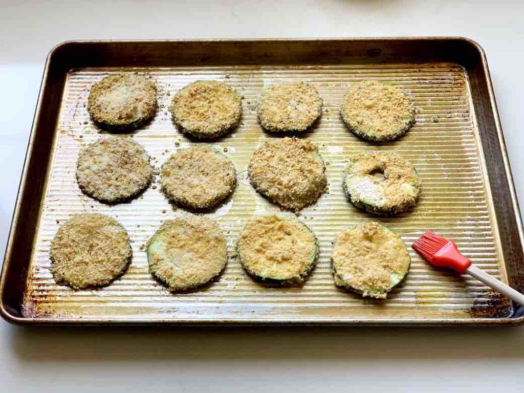 breaded zucchini chips on pan