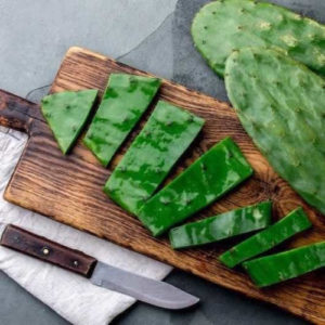 cutting nopales on cutting board