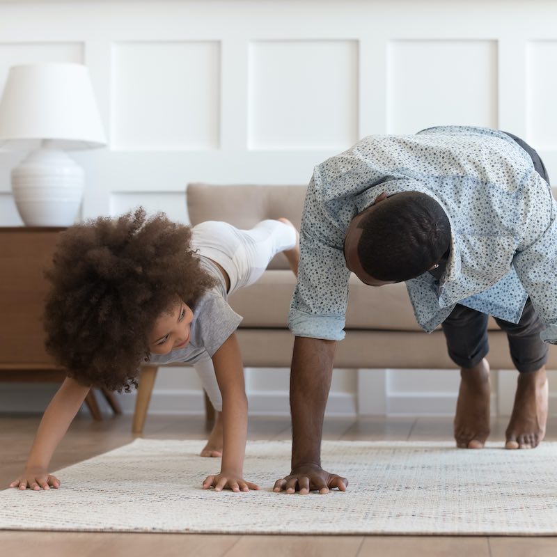 black father and kid doing pushups — Health, Kids
